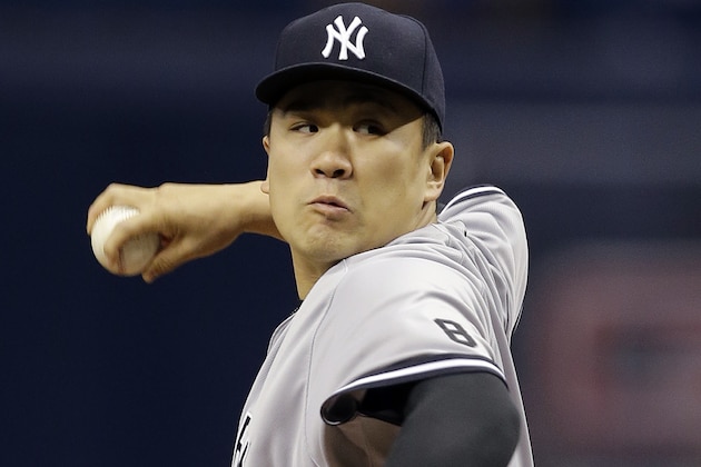 New York Yankees starting pitcher Masahiro Tanaka, of Japan, goes into his windup against the Tampa Bay Rays during the first inning of a baseball game Friday, May 27, 2016, in St. Petersburg, Fla. (AP Photo/Chris O'Meara)