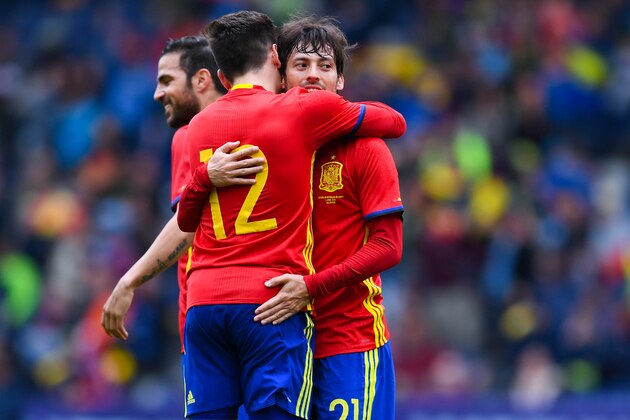 SALZBURG, AUSTRIA - JUNE 01:  David Silva (R) of Spain celebrates with his teammates after scoring the opening goal during an international friendly match between Spain and Korea at the Red Bull Arena stadium on June 1, 2016 in Salzburg, Austria.  (Photo by David Ramos/Getty Images)