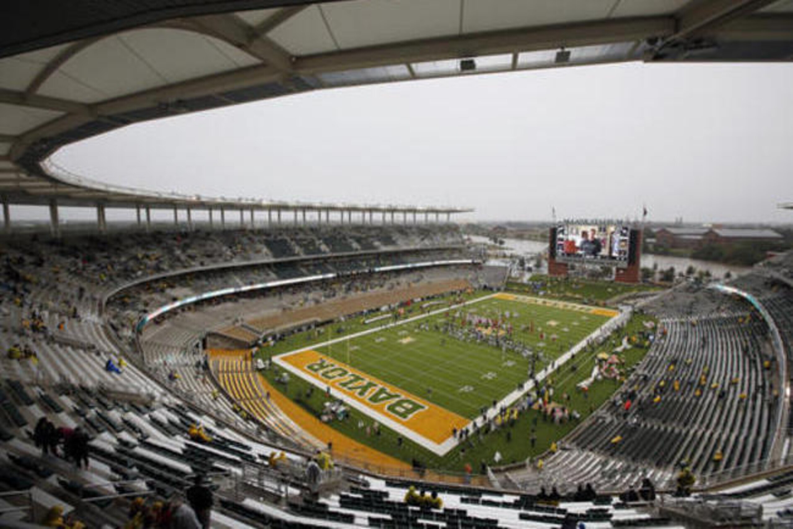 FILE - In this Oct. 24, 2015, file photo, a nearly empty McLane Stadium is seen minutes before kickoff between Iowa State and Baylor in an NCAA college football game, in Waco, Texas. Baylor University will look to rebuild its reputation and perhaps its football program after an outside review found administrators mishandled allegations of sexual assault and the team operated under the perception it was above the rules. (AP Photo/Tony Gutierrez, File)