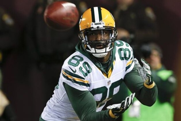 FILE - In this Nov. 22, 2015, file photo, Green Bay Packers wide receiver James Jones (89) makes a catch for a touchdown against the Minnesota Vikings during the second half of an NFL football game,  in Minneapolis. After a 6-0 start, a once potent offense limped through the final 10 games of the regular season with a 4-6 record. Still, by the end of the year, the injury-riddled Packers (11-7) had forged a grind-it-out mentality that relied just as much on defense as on quarterback Aaron Rodgers’ right arm. The formula worked up until the very last minute of their last game. (AP Photo/Jim Mone, File)