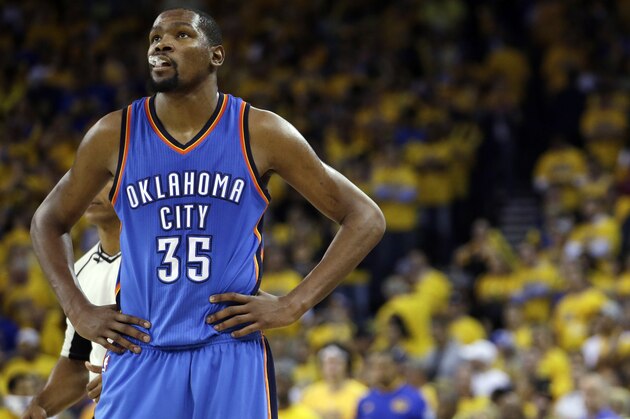 FILE - In this May 26, 2016, file photo, Oklahoma City Thunder's Kevin Durant watches during the closing minutes of the second half in Game 5 of the NBA basketball Western Conference finals against the Golden State Warriors in Oakland, Calif. Durant may not be ready to talk about his free agency yet, but it's one of the biggest issues facing the Oklahoma City Thunder after losing in seven games of the Western Conference finals to Golden State. (AP Photo/Marcio Jose Sanchez, File)