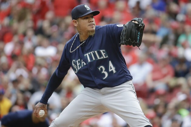 Seattle Mariners starting pitcher Felix Hernandez throws in the first inning of a baseball game against the Cincinnati Reds, Saturday, May 21, 2016, in Cincinnati. The Mariners won 4-0. (AP Photo/John Minchillo)