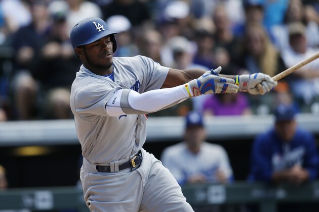 Los Angeles Dodgers right fielder Yasiel Puig (66) in the third inning of a baseball game Sunday, April 24, 2016, in Denver. The Dodgers won 12-10. (AP Photo/David Zalubowski)