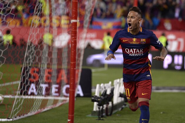 Barcelona's Brazilian forward Neymar celebrates a goal during the Spanish 'Copa del Rey' (King's Cup) final match FC Barcelona vs Sevilla FC at the Vicente Calderon stadium in Madrid on May 22, 2016. / AFP / JOSEP LAGO        (Photo credit should read JOSEP LAGO/AFP/Getty Images)