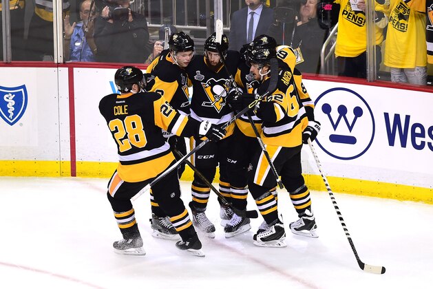 PITTSBURGH, PA - JUNE 01:  Phil Kessel #81 of the Pittsburgh Penguins celebrates with teammates after scoring a second period goal against Martin Jones #31 of the San Jose Sharks (not pictured) in Game Two of the 2016 NHL Stanley Cup Final at Consol Energy Center on June 1, 2016 in Pittsburgh, Pennsylvania.  (Photo by Matt Kincaid/Getty Images)