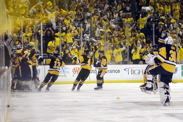 Pittsburgh Penguins goalie Matt Murray, right, rushes to join his teammates as they mob Conor Sheary after his game-winning goal against the San Jose Sharks during the first overtime period in Game 2 of the NHL hockey Stanley Cup Finals on Wednesday, June 1, 2016, in Pittsburgh. The Penguins won 2-1 to take a 2-0 game lead in the series. (AP Photo/Keith Srakocic) Pittsburgh Penguins goalie Matt Murray, right, rushes to join his teammates as they mob Conor Sheary after his game-winning goal against the San Jose Sharks during the first overtime period in Game 2 of the NHL hockey Stanley Cup Finals on Wednesday, June 1, 2016, in Pittsburgh. The Penguins won 2-1 to take a 2-0 game lead in the series. (AP Photo/Keith Srakocic)