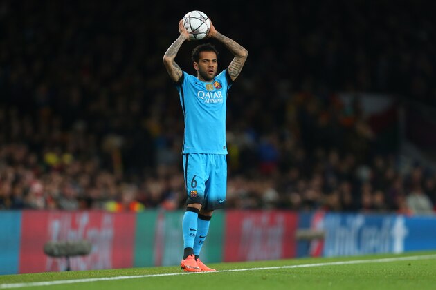 LONDON, ENGLAND - FEBRUARY 23 :  Dani Alves of FC Barcelona takes a throw in during the UEFA Champions League match between Arsenal and Barcelona at the Emirates Stadium on February 23, 2016 in London, United Kingdom.  (Photo by Catherine Ivill - AMA/Getty Images)