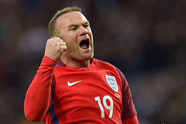 England's striker Wayne Rooney celebrates after scoring his team's second goal during the friendly football match between England and Australia at the Stadium of Light in Sunderland, north east England, on May 27, 2016. / AFP / PAUL ELLIS / NOT FOR MARKETING OR ADVERTISING USE / RESTRICTED TO EDITORIAL USE        (Photo credit should read PAUL ELLIS/AFP/Getty Images)