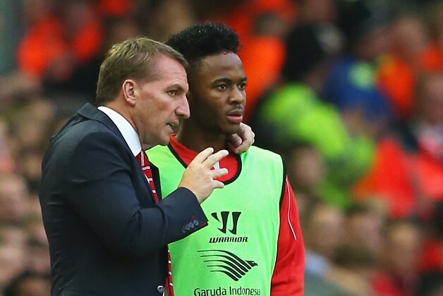 LIVERPOOL, ENGLAND - SEPTEMBER 13: Brendan Rodgers, manager of Liverpool talks to Raheem Sterling of Liverpool during the Barclays Premier League match between Liverpool and Aston Villa at Anfield on September 13, 2014 in Liverpool, England.  (Photo by Alex Livesey/Getty Images)