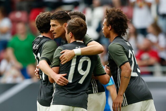 AUGSBURG, GERMANY - MAY 29:  Mario Gomez (2.L) of Germany celebrates with his teammates after scoring the first goal by penalty during the International Friendly match between Germany and Slovakia at WWK-Arena on May 29, 2016 in Augsburg, Germany.  (Photo by Boris Streubel/Getty Images)
