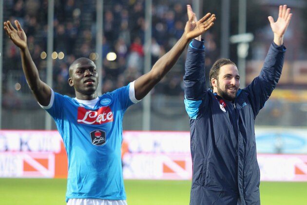 FROSINONE, ITALY - JANUARY 10:  Gonzalo Higuain (R) with his teammate Kalidou Koulibaly of SSC Napoli celebrates their victory after Serie A match between Frosinone Calcio and SSC Napoli at Stadio Matusa on January 10, 2016 in Frosinone, Italy.  (Photo by Paolo Bruno/Getty Images)