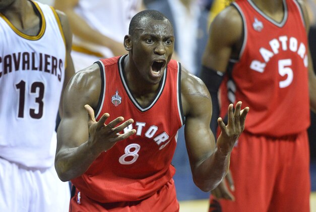 May 19, 2016; Cleveland, OH, USA; Toronto Raptors center Bismack Biyombo (8) reacts in the second quarter against the Cleveland Cavaliers in game two of the Eastern conference finals of the NBA Playoffs at Quicken Loans Arena. Mandatory Credit: David Richard-USA TODAY Sports