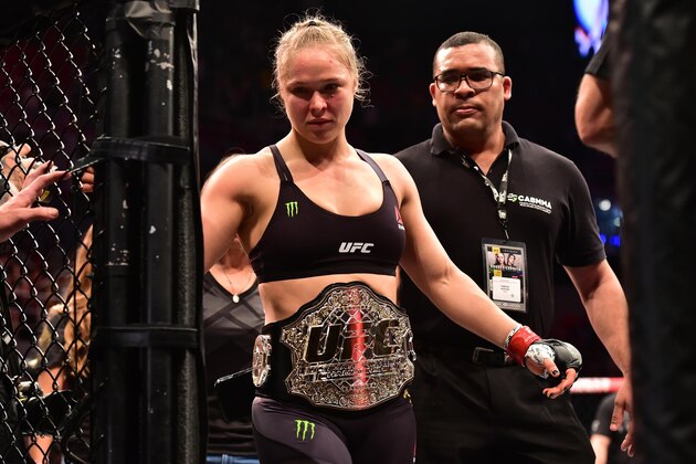 Aug 1, 2015; Rio de Janeiro, RJ, Brazil; Ronda Rousey (red gloves) celebrates after defeating Bethe Correia (not pictured) during UFC 190 at HSBC Arena. Mandatory Credit: Jason Silva-USA TODAY Sports