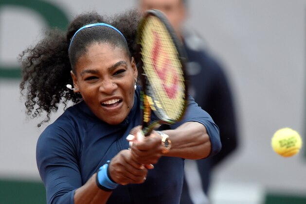 US player Serena Williams returns the ball to Kazakhstan's Yulia Putintseva during their women's quarter-final match at the Roland Garros 2016 French Tennis Open in Paris on June 2, 2016. / AFP / Eric FEFERBERG        (Photo credit should read ERIC FEFERBERG/AFP/Getty Images)