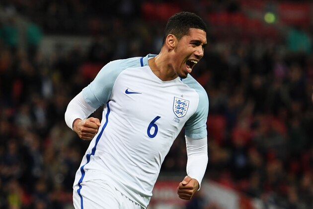 LONDON, ENGLAND - JUNE 02:  Chris Smalling of England celebrates as he scores their first goal during the international friendly match between England and Portugal at Wembley Stadium on June 2, 2016 in London, England.  (Photo by Shaun Botterill/Getty Images)