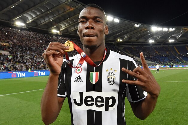 ROME, ITALY - MAY 21:  Paul Pogba of Juventus FC celebrates the victory after the TIM Cup match between AC Milan and Juventus FC at Stadio Olimpico on May 21, 2016 in Rome, Italy.  (Photo by Giuseppe Bellini/Getty Images)