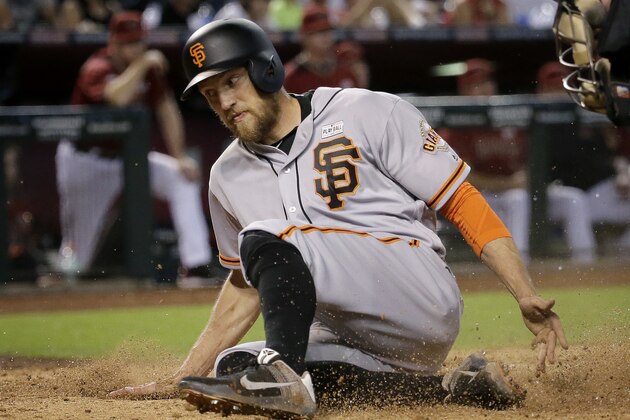 San Francisco Giants' Hunter Pence scores on an RBI-double by teammate Brandon Crawford during the ninth inning of a baseball game against the Arizona Diamondbacks, Sunday, May 15, 2016, in Phoenix. (AP Photo/Matt York) San Francisco Giants' Hunter Pence scores on an RBI-double by teammate Brandon Crawford during the ninth inning of a baseball game against the Arizona Diamondbacks, Sunday, May 15, 2016, in Phoenix. (AP Photo/Matt York)