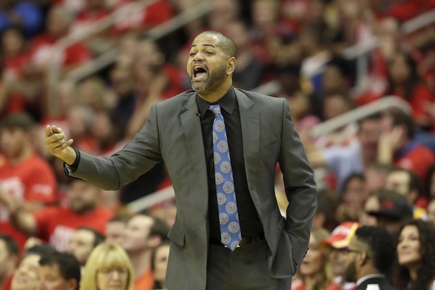 Houston Rockets' J.B. Bickerstaff yells from the sidelines during the first half in Game 4 of a first-round NBA basketball playoff series, Sunday against the Golden State Warriors, April 24, 2016, in Houston. (AP Photo/David J. Phillip)