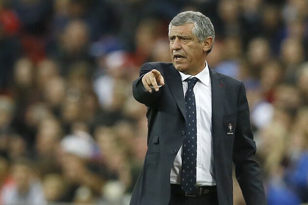Portugal's head coach Fernando Santos points from the pitch side during the international friendly soccer match between England and Portugal at Wembley stadium in London, Thursday, June 2, 2016. (AP Photo/Kirsty Wigglesworth)