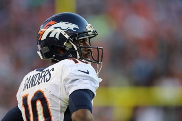 FILE - In this Feb. 7, 2016, file photo Denver Broncos’ Emmanuel Sanders watches from the sidelines against the  Carolina Panthers’ during the NFL football's Super Bowl 50 in Santa Clara, Calif. It's a new year, and while many of his teammates talk about putting 2015 in the rearview, Sanders is having none of it.  (AP Photo/Gregory Payan, File)