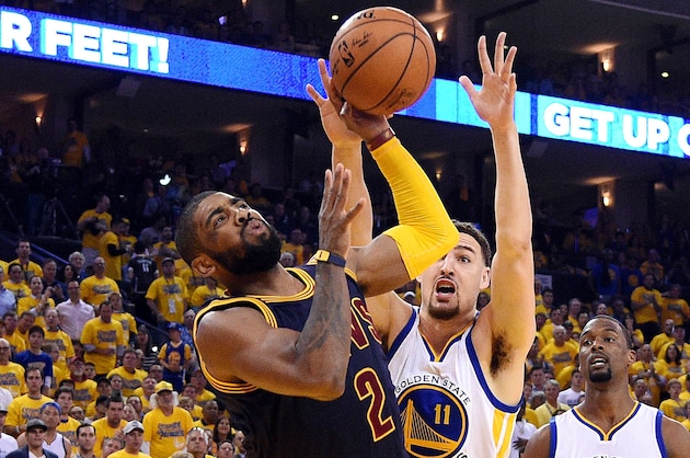 Jun 2, 2016; Oakland, CA, USA; Cleveland Cavaliers guard Kyrie Irving (2) shoots the ball against Golden State Warriors guard Klay Thompson (11) during the second quarter in game one of the NBA Finals at Oracle Arena. Mandatory Credit: Kyle Terada-USA TODAY Sports