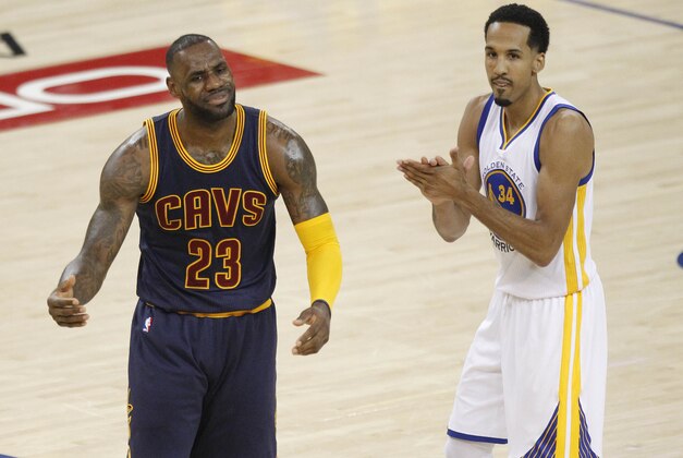 June 2, 2016; Oakland, CA, USA; Cleveland Cavaliers forward LeBron James (23) reacts as Golden State Warriors guard Shaun Livingston (34) claps during the first half in game one of the NBA Finals at Oracle Arena. Mandatory Credit: Cary Edmondson-USA TODAY Sports