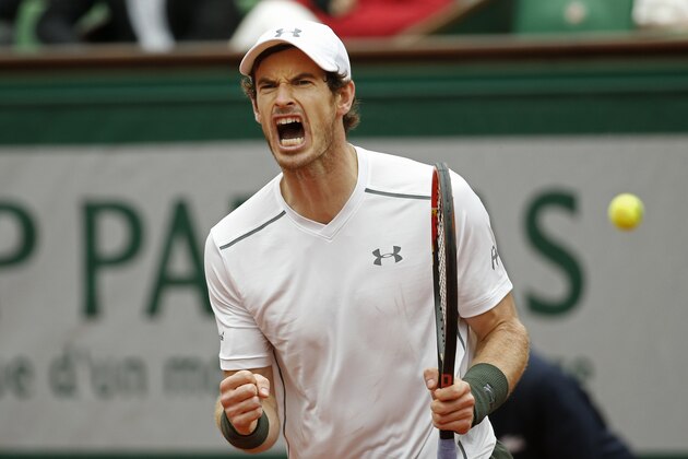 Britain's Andy Murray clenches his fist after scoring a point the semifinal match of the French Open tennis tournament against Switzerland's Stan Wawrinka at the Roland Garros stadium in Paris, France, Friday, June 3, 2016. (AP Photo/Alastair Grant)
