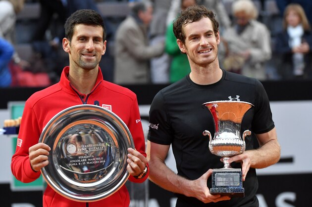 Britain's Andy Murray poses next to Novak Djokovic of Serbia after after winning the men's final match at the ATP Tennis Open on May 15, 2016 at the Foro Italico in Rome. / AFP / TIZIANA FABI        (Photo credit should read TIZIANA FABI/AFP/Getty Images)