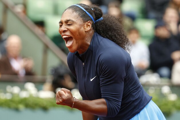 Serena Williams of the U.S. clenches her fist after scoring a point in the semifinal match of the French Open tennis tournament against Netherlands' Kiki Bertens at the Roland Garros stadium in Paris, France, Friday, June 3, 2016. (AP Photo/Alastair Grant)