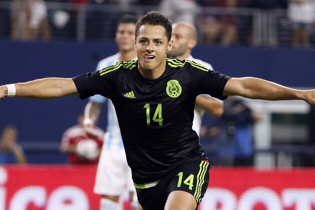 FILE - In this Sept. 8, 2015, file photo, Mexico's Javier Hernandez celebrates after scoring a penalty kick during a friendly soccer match against Argentina at the AT&T Stadium in Arlington, Texas. (AP Photo/Tony Gutierrez, File)