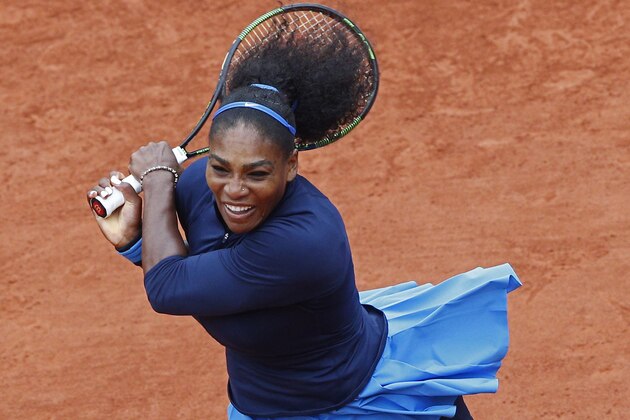 Serena Williams of the U.S. returns the ball in the semifinal match of the French Open tennis tournament against Netherlands' Kiki Bertens at the Roland Garros stadium in Paris, France, Friday, June 3, 2016. (AP Photo/Christophe Ena)