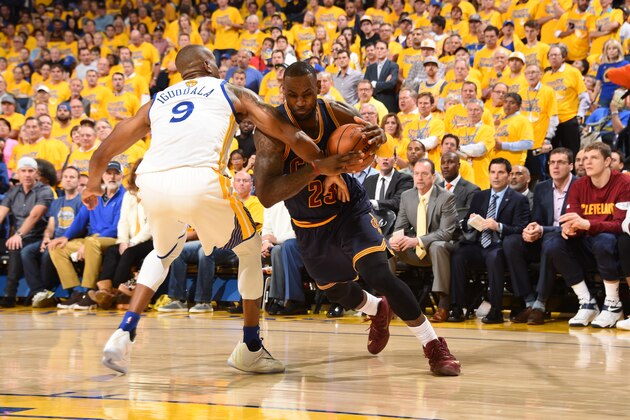 OAKLAND, CA - JUNE 2:  LeBron James #23 of the Cleveland Cavaliers handles the ball against the Golden State Warriors in Game One of the 2016 NBA Finals on June 2, 2016 at Oracle Arena in Oakland, California. NOTE TO USER: User expressly acknowledges and agrees that, by downloading and or using this photograph, user is consenting to the terms and conditions of Getty Images License Agreement. Mandatory Copyright Notice: Copyright 2016 NBAE (Photo by Andrew D. Bernstein/NBAE via Getty Images)