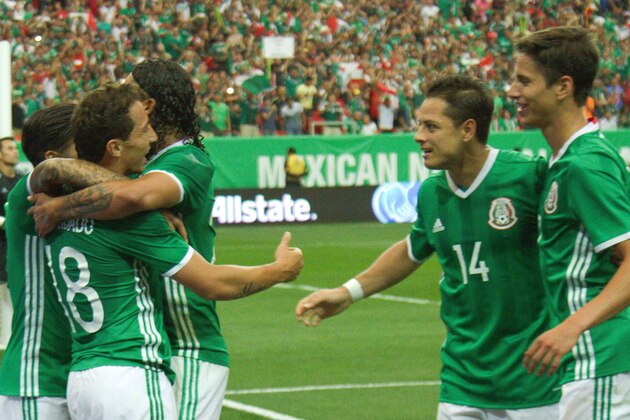 Andres Guardado of Mexico celebrates his goal with his team during the friendly match between the Mexican national team and Paraguay national team at the Georgia Dome in Atlanta, Georgia on May 28, 2016. / AFP / VICTOR STRAFFON        (Photo credit should read VICTOR STRAFFON/AFP/Getty Images)