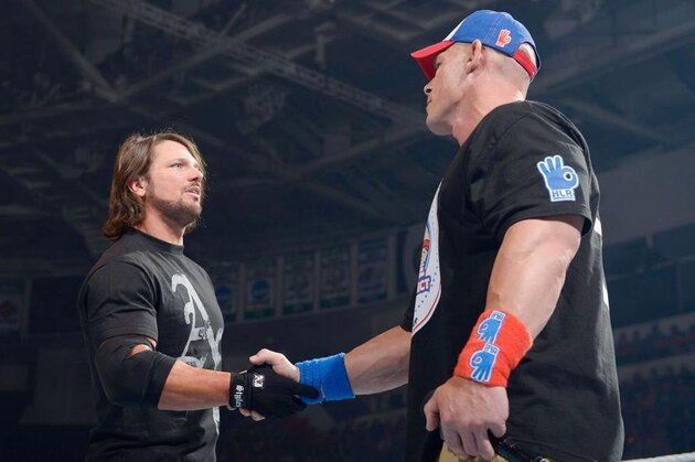 John Cena and AJ Styles in the same ring for the first time ever.