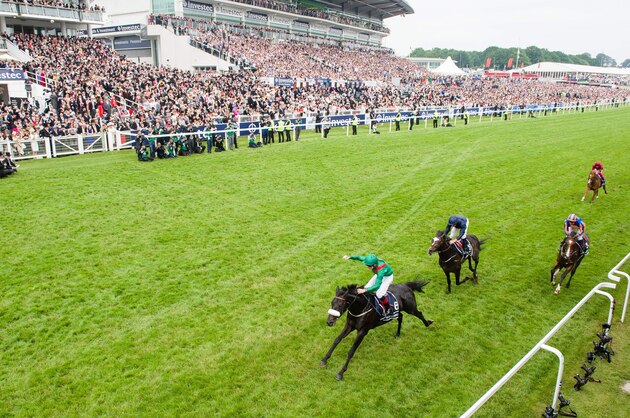 Harzand ridden by Pat Smullen wins the Derby on the second day of the Epsom Derby Festival in Surrey, southern England, on June 4, 2016. 
Harzand won ahead of US Army Ranger and Idaho. / AFP / LEON NEAL        (Photo credit should read LEON NEAL/AFP/Getty Images)