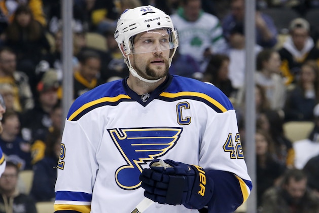 St. Louis Blues center David Backes (42) prepares for a face-off during the second period of an NHL hockey game against the Pittsburgh Penguins in Pittsburgh Tuesday, March 24, 2015. (AP Photo/Gene J. Puskar)