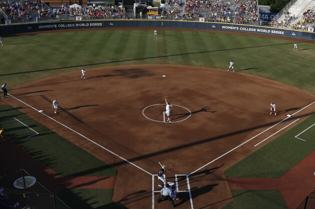 Florida's Lauren Haeger pitches in the first inning of the final game against Michigan in the NCAA softball Women's College World Series, Wednesday, June 3, 2015, in Oklahoma City. (AP Photo/Sue Ogrocki)