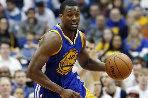 Golden State Warriors’ Harrison Barnes plays against the Minnesota Timberwolves in the first quarter of an NBA basketball game Monday, March 21, 2016, in Minneapolis. (AP Photo/Jim Mone)