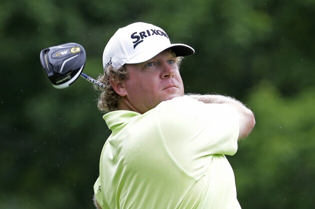 William McGirt watches his tee shot on the 18th hole during the third round of the Memorial golf tournament, Saturday, June 4, 2016, in Dublin, Ohio. (AP Photo/Darron Cummings)