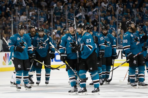 SAN JOSE, CA - JUNE 04:  Joonas Donskoi #27 of the San Jose Sharks celebrates with his teammates after scoring the game winning goal in overtime to defeat the Pittsburgh Penguins in Game Three of the 2016 NHL Stanley Cup Final with a score of 3 to 2 at SAP Center on June 4, 2016 in San Jose, California.  (Photo by Christian Petersen/Getty Images)