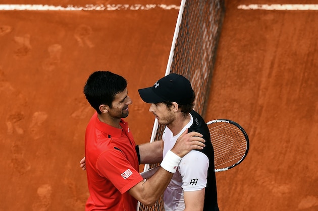 Andy Murray of Great Britain (R) is congratulated by Serbian Novak Djokovic after winning the final match of the ATP Tennis Open tournament game at the Foro Italico in Rome on May 15, 2016. / AFP / FILIPPO MONTEFORTE        (Photo credit should read FILIPPO MONTEFORTE/AFP/Getty Images)