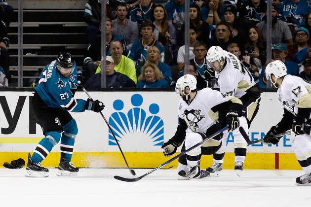 SAN JOSE, CA - JUNE 04:  Joonas Donskoi #27 of the San Jose Sharks shoots the puck to score the game winning goal in overtime against Matt Murray #30 of the Pittsburgh Penguins in Game Three of the 2016 NHL Stanley Cup Final at SAP Center on June 4, 2016 in San Jose, California.  (Photo by Christian Petersen/Getty Images)