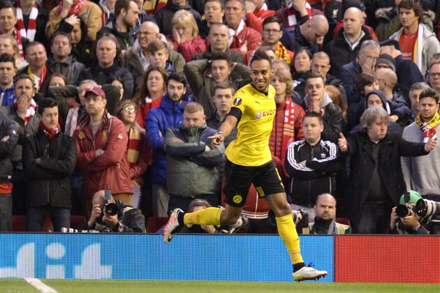 Dortmund's Gabonese striker Pierre-Emerick Aubameyang celebrates after scoring during the UEFA Europa league quarter-final second leg football match between Liverpool and Borussia Dortmund at Anfield stadium in Liverpool on April 14, 2016. / AFP / OLI SCARFF        (Photo credit should read OLI SCARFF/AFP/Getty Images)