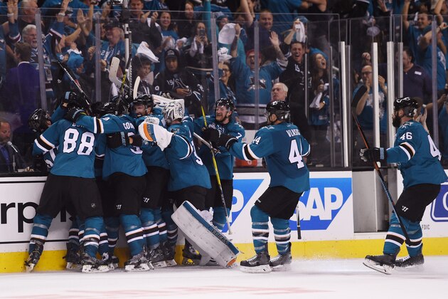 Jun 4, 2016; San Jose, CA, USA; San Jose Sharks right wing Joonas Donskoi (27) celebrates with teammates after scoring the game-winning goal against the Pittsburgh Penguins in the overtime period of game three of the 2016 Stanley Cup Final at SAP Center at San Jose. Mandatory Credit: Kyle Terada-USA TODAY Sports