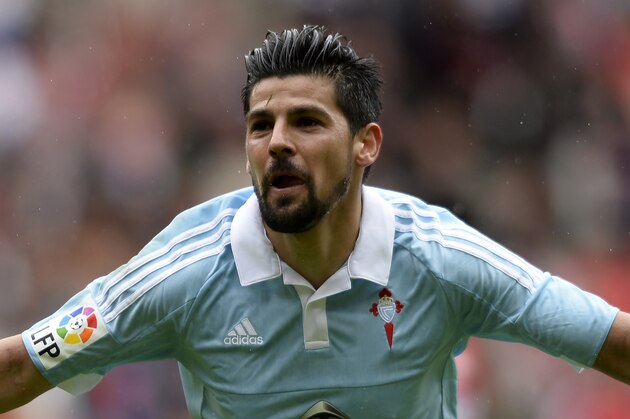 Celta Vigo's forward Nolito celebrates a goal during the Spanish league football match Real Sporting de Gijon vs RC Celta de Vigo at El Molinon stadium in Gijon on April 10, 2016. / AFP / MIGUEL RIOPA        (Photo credit should read MIGUEL RIOPA/AFP/Getty Images)