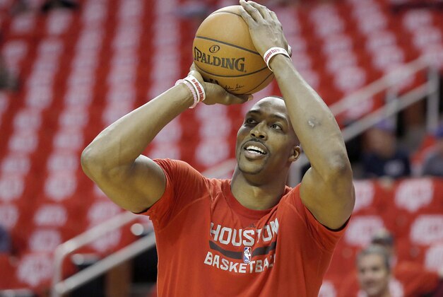 Apr 24, 2016; Houston, TX, USA; Houston Rockets center Dwight Howard (12) warms up before playing against the  Golden State Warriors in game four of the first round of the NBA Playoffs at Toyota Center. Mandatory Credit: Thomas B. Shea-USA TODAY Sports