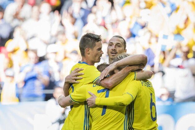 Sweden's midfielder Emil Forsberg (R) celebrates with his forward and team captain Zlatan Ibrahimovic and teammates after scoring a goal during the friendly football match between Sweden and Wales at Friends Arena in Solna near Stockholm on June 5, 2016.  / AFP / JONATHAN NACKSTRAND        (Photo credit should read JONATHAN NACKSTRAND/AFP/Getty Images)