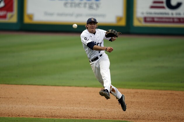 Rice infielder Ford Proctor (8) throws out Southeastern Louisiana's Daniel Midyett in the sixth inning of an NCAA college regional baseball game in Baton Rouge, La., Saturday, June 4, 2016. (AP Photo/Gerald Herbert)