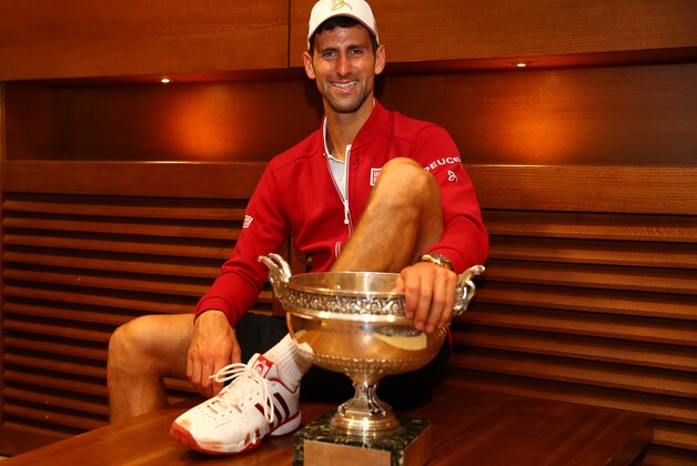PARIS, FRANCE - JUNE 05:  Champion Novak Djokovic of Serbia celebrates following his victory during the Men's Singles final match against Andy Murray of Great Britain on day fifteen of the 2016 French Open at Roland Garros on June 5, 2016 in Paris, France.  (Photo by Clive Brunskill for Adidas/Getty Images)