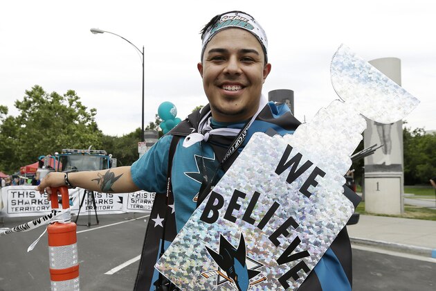 San Jose Sharks fan Armando Alvarez stands outside of SAP Center at San Jose before Game 3 of the NHL hockey Stanley Cup Final series between the Sharks and the Pittsburgh Penguins in San Jose, Calif., Saturday, June 4, 2016. (AP Photo/Eric Risberg)
